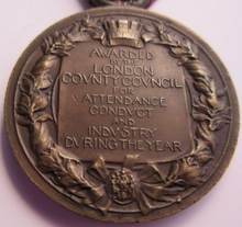 Load image into Gallery viewer, 1912-1913 THE KINGS MEDAL FOR LCC ATTENDANCE GOOD CONDUCT & INDUSTRY WITH RIBBON