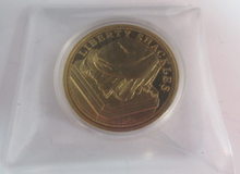 Load image into Gallery viewer, LIBERTY SHACKLES 1886 STATUE OF LIBERTY GOLD PLATED PROOF MEDAL &amp; CAPSULE
