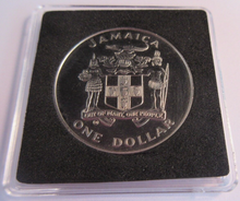 Load image into Gallery viewer, 1982 WORLD CHAMPIONSHIP OF FOOTBALL JAMAICA 1 DOLLAR PROOF COIN &amp; QUAD CAPSULE
