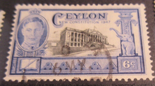 Load image into Gallery viewer, KING GEORGE VI CEYLON, DOMINICA, CYPRUS BRITISH GUIANA &amp; COOK ISLANDS STAMPS
