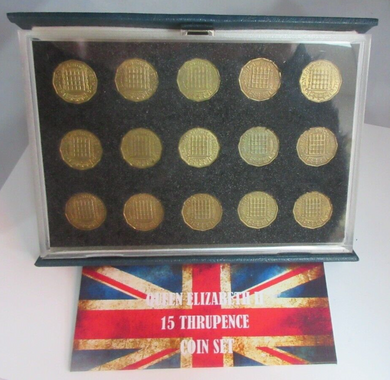 1953-1967 QUEEN ELIZABETH II BRASS THREEPENCE 3d 15 COIN SET IN R/MINT BLUE BOOK