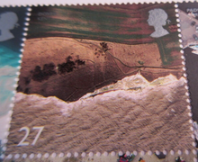 Load image into Gallery viewer, 2002 BRITISH COASTLINES 10 STAMPS MNH IN CLEAR FRONTED HOLDER
