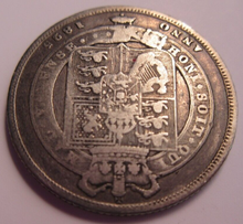 Load image into Gallery viewer, 1825 KING GEORGE IV SHILLING AVF PRESENTED IN PROTECTIVE CLEAR FLIP
