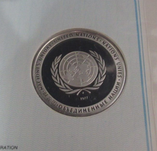 Load image into Gallery viewer, 1977 Fighting Against Racism First Edition United Nations Silver Proof Medal
