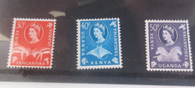 Load image into Gallery viewer, Kenya, Uganda, Tanganyika 5 Cents - $1 1954 Queen Elizabeth II 9 Stamp Set
