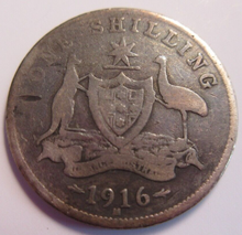 Load image into Gallery viewer, KING GEORGE V ONE SHILLING COIN .925 SILVER G-F 1916 AUSTRALIA IN CLEAR FLIP
