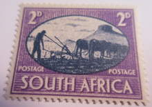 Load image into Gallery viewer, 1945 SOUTH AFRICA OVERPRINTS IN 2 LANGUAGES IN STAMP HOLDER
