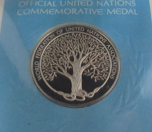 Load image into Gallery viewer, 1976 Promoting Understanding First Edition United Nations Silver Proof Medal
