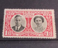 Load image into Gallery viewer, KING GEORGE VI VICTORY ISSUES 1939-1945  SOUTHERN RHODESIA MH IN STAMP HOLDER
