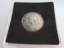 Load image into Gallery viewer, 1887 QUEEN VICTORIA JUBILEE HEAD .925 SILVER EF SHILLING IN QUADRANT CAPSULE
