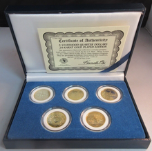 Load image into Gallery viewer, 1999 FIVE STATEHOOD QUARTER DOLLARS GOLD PLATED SPECIAL EDITION 5 COIN SET BOXED
