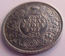 Load image into Gallery viewer, 1917 KING GEORGE V STERLING SILVER TWO ANNAS AUNC PRESENTED IN CLEAR FLIP
