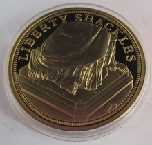 Load image into Gallery viewer, LIBERTY SHACKLES 1886 STATUE OF LIBERTY GOLD PLATED PROOF MEDAL &amp; CAPSULE
