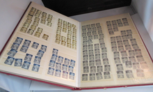 Load image into Gallery viewer, STOCK BOOK RED INCLUDES HUNDREDS OF USED STAMPS - PLEASE SEE PHOTOGRAPHS
