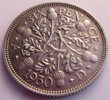 Load image into Gallery viewer, 1930 KING GEORGE V BARE HEAD .500 SILVER UNC 6d SIXPENCE COIN IN CLEAR FLIP
