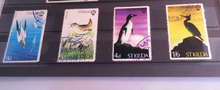 Load image into Gallery viewer, VARIOUS WORLD STAMPS X 24 MNH IN CLEAR FRONTED STAMP HOLDER
