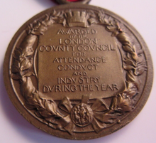 Load image into Gallery viewer, 1912-1913 THE KINGS MEDAL FOR LCC ATTENDANCE GOOD CONDUCT &amp; INDUSTRY WITH RIBBON
