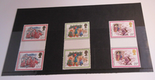 Load image into Gallery viewer, 1982 CHRISTMAS CAROLS  DECIMAL STAMPS GUTTER PAIRS MNH IN STAMP HOLDER

