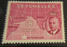 Load image into Gallery viewer, 1938-1952 KING GEORGE VI SEYCHELLES STAMPS &amp; STAMP HOLDER
