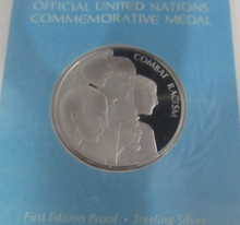 Load image into Gallery viewer, 1977 Fighting Against Racism First Edition United Nations Silver Proof Medal
