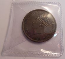 Load image into Gallery viewer, KING GEORGE VI STATES OF JERSEY ONE TWELFTH OF A SHILLING 1945 UNC IN CLEAR FLIP
