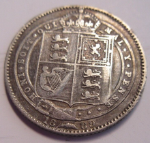 Load image into Gallery viewer, QUEEN VICTORIA SHILLING 1889 VF-EF .925 SILVER ONE SHILLING COIN IN CLEAR FLIP
