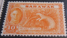 Load image into Gallery viewer, 1947-1949 KING GEORGE VI SARAWAK STAMPS &amp; STAMP HOLDER
