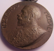 Load image into Gallery viewer, 1913-1914 THE KINGS MEDAL FOR LCC ATTENDANCE GOOD CONDUCT &amp; INDUSTRY WITH RIBBON
