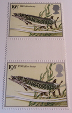 Load image into Gallery viewer, 1983/4 CHRISTMAS DECIMAL STAMPS GUTTER PAIRS MNH IN CLEAR FRONTED STAMP HOLDER

