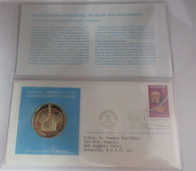 Load image into Gallery viewer, 1976 Economic Cooperation Crisis First Edition United Nations Silver Proof Medal
