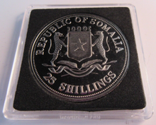 Load image into Gallery viewer, 1967-2023 ATTACK ON PEARL HARBOUR SOMALIA 25 SHILLINGS COIN WITH BOX &amp; COA
