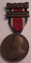 Load image into Gallery viewer, 1913-1914 THE KINGS MEDAL FOR LCC ATTENDANCE GOOD CONDUCT &amp; INDUSTRY WITH RIBBON
