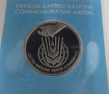 Load image into Gallery viewer, 1977 To Avert a Worldwide Crisis First Edition United Nations Silver Proof Medal
