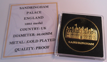 Load image into Gallery viewer, 1995 SANDRINGHAM PALACE GOLD PLATED PROOF MEDAL CAPSULE &amp; COA
