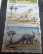 Load image into Gallery viewer, Dinosaurs 4 x Stamps + Postcard T- Rex, Stegosaurus + More S. Tome E Principe
