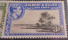 Load image into Gallery viewer, KING GEORGE VI GILBERT &amp; ELLICE ISLANDS STAMPS &amp; STAMP HOLDER
