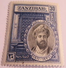 Load image into Gallery viewer, 1936 SULTANS SILVER JUBILEE MINT ZANZIBAR STAMPS WITH CLEAR FRONTED STAMP HOLDER
