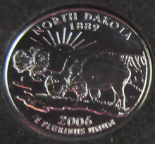 Load image into Gallery viewer, 2006 UNITED STATES MINT STATE QUARTER DOLLAR NORTH DAKOTA 1889 PLATINUM PLATED
