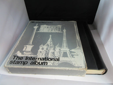 STANLEY GIBBONS THE INTERNATIONAL STAMP ALBUM WITH OUER COVER & SOME STAMPS