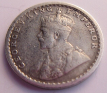 Load image into Gallery viewer, 1913 KING GEORGE V STERLING SILVER TWO ANNAS VF PRESENTED IN CLEAR FLIP
