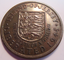 Load image into Gallery viewer, KING GEORGE VI STATES OF JERSEY ONE TWELFTH OF A SHILLING 1945 UNC IN CLEAR FLIP

