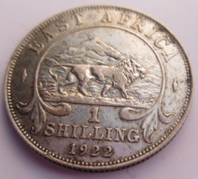 Load image into Gallery viewer, 1922 KING GEORGE V EAST AFRICA EF ONE SHILLING COIN &amp; CLEAR FLIP
