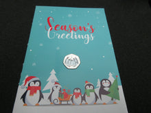 Load image into Gallery viewer, 2017Christmas penguins 50p Coin - Cupro Nickel Coloured Diamond Finish in a Card
