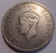 Load image into Gallery viewer, 1940 KING GEORGE VI INDIA ONE RUPEE .500 SILVER IN PROTECTIVE CLEAR FLIP

