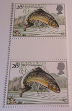 Load image into Gallery viewer, 1983/4 CHRISTMAS DECIMAL STAMPS GUTTER PAIRS MNH IN CLEAR FRONTED STAMP HOLDER

