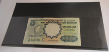 Load image into Gallery viewer, 1959 BANKNOTE MALAYA &amp; BRITISH BORNEO ONE DOLLAR WITH NOTE HOLDER

