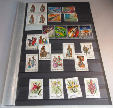 VARIOUS WORLD STAMPS RWANDA MNH & MH WITH STAMP HOLDER