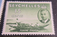 Load image into Gallery viewer, 1938-1952 KING GEORGE VI SEYCHELLES STAMPS &amp; STAMP HOLDER
