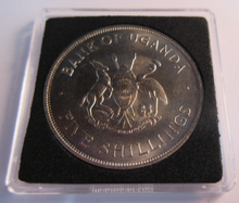 Load image into Gallery viewer, 1968 PRODUCE MORE FOOD BANK OF UGANDA FIVE SHILLING COIN BUNC WITH BOX &amp; COA
