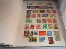 Load image into Gallery viewer, STANLEY GIBBONS THE INTERNATIONAL STAMP ALBUM WITH OUER COVER &amp; SOME STAMPS
